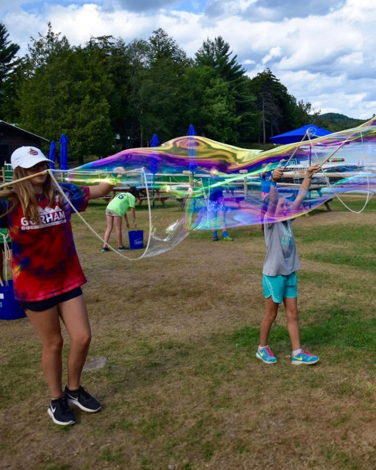 A group enjoying BubbleStix giant bubbles